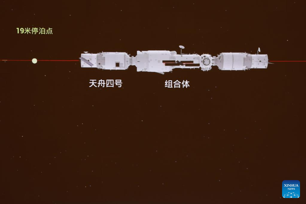 China's cargo craft docks with space station combination