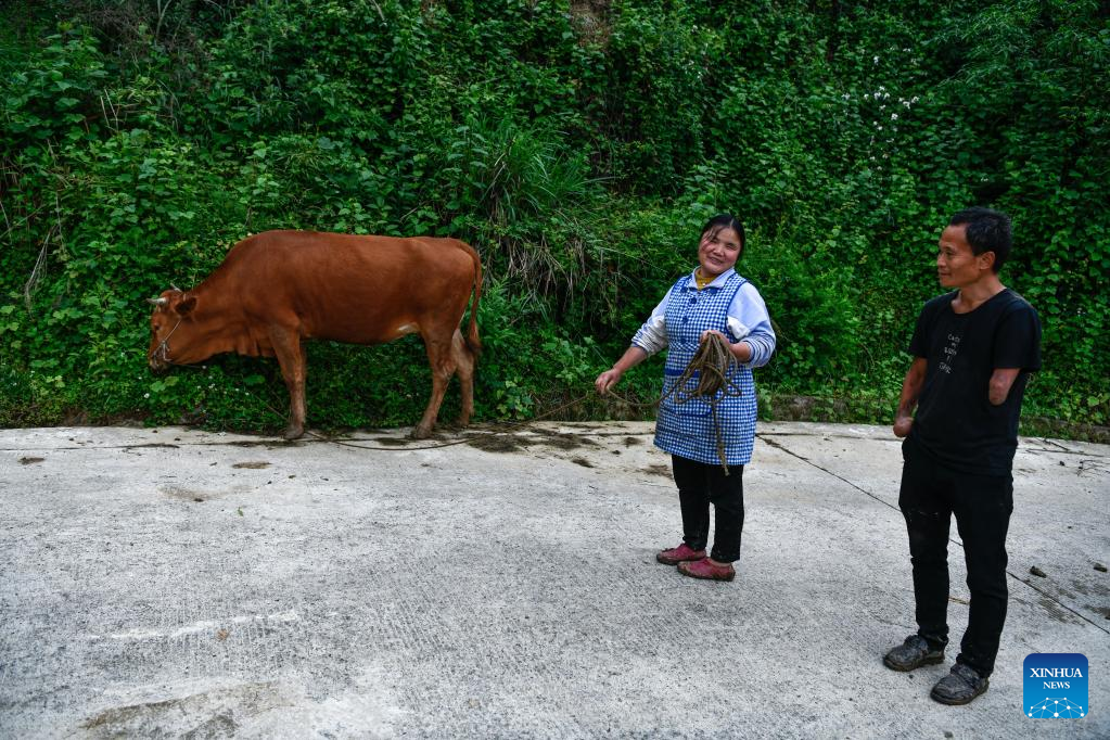 In pics: Life story of disabled couple in Guizhou, SW China