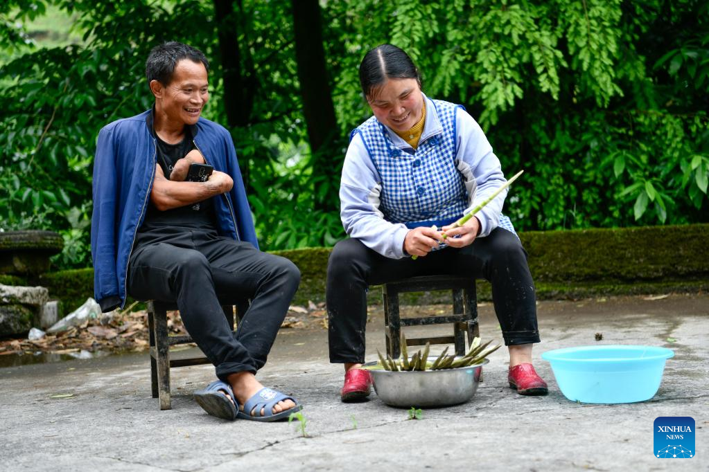 In pics: Life story of disabled couple in Guizhou, SW China