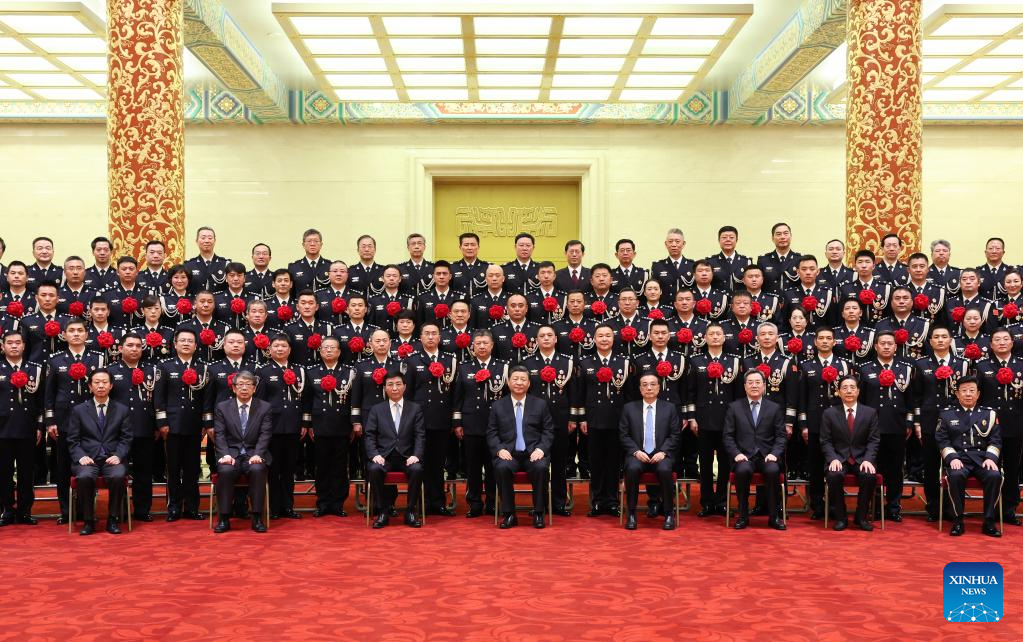 Xi meets heroes, role models from public security system