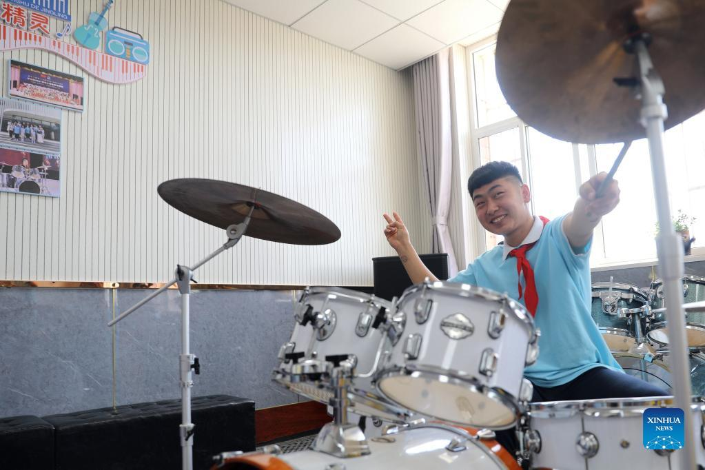 Students play musical instruments in Xinji Special Education School, N China's Hebei
