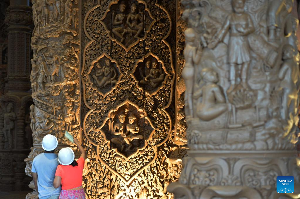 Tourists visit Sanctuary of Truth in Pattaya, Thailand