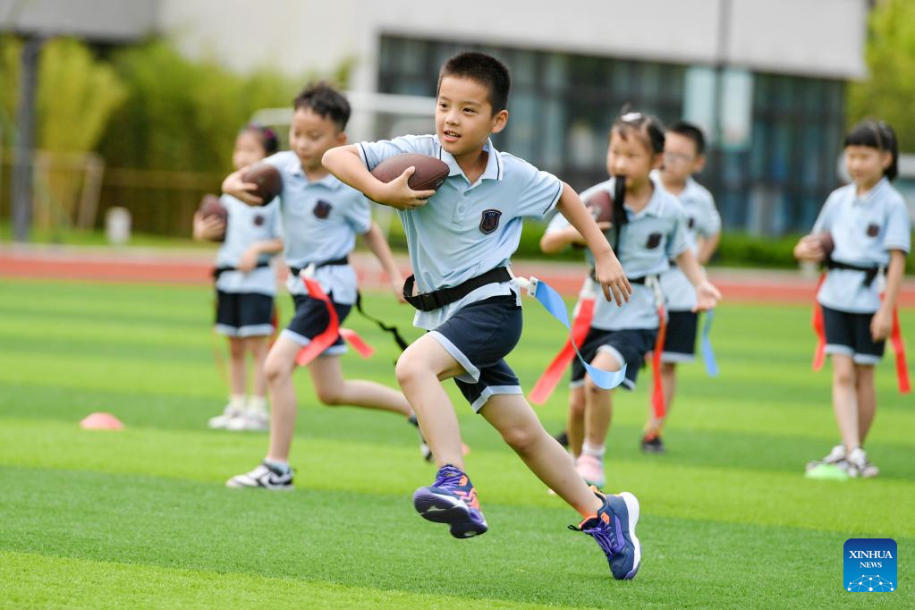 Children experience different activities during summer vacation across China