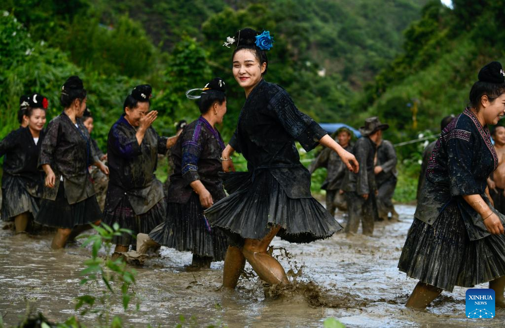 Villagers perform water drum dance in Jianhe County, SW China