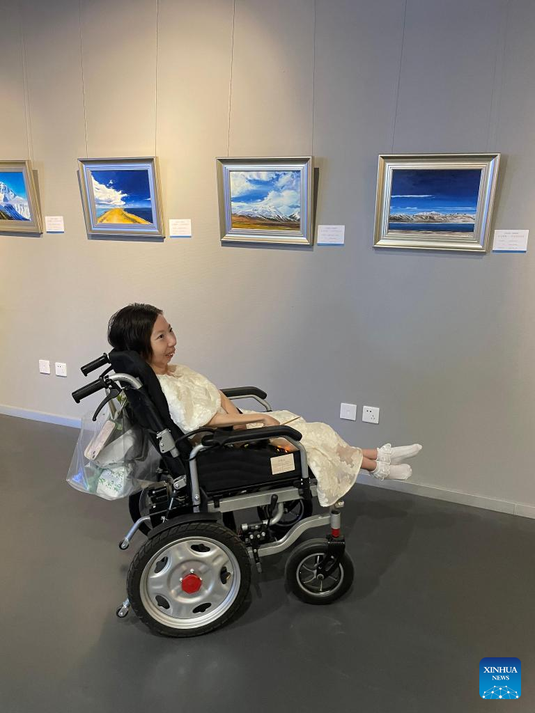 Feature: Paralyzed Chinese artist experiences world through paint