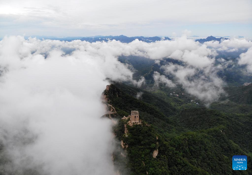 View of Jinshanling section of Great Wall amid clouds in north China