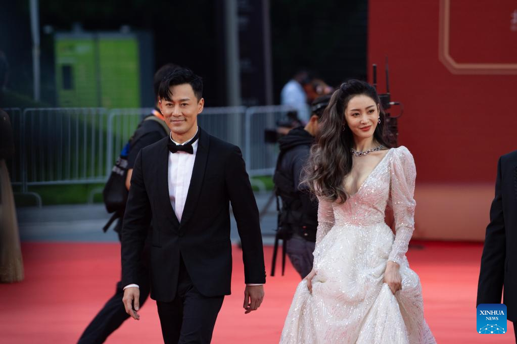 In pics: Stars sparkle on red carpet of 12th Beijing International Film Festival