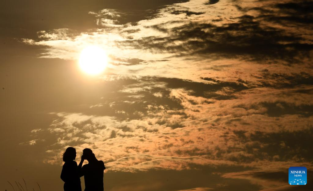 People enjoy scenery near Bosporus Strait in Istanbul, Türkiye