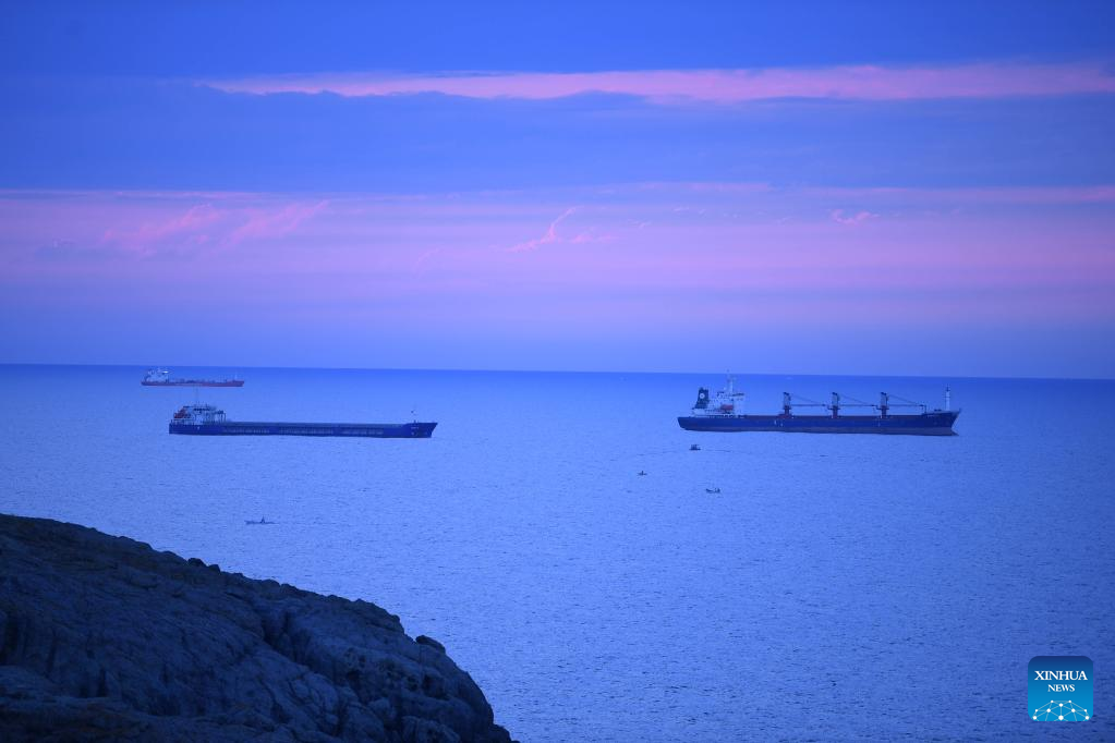 People enjoy scenery near Bosporus Strait in Istanbul, Türkiye