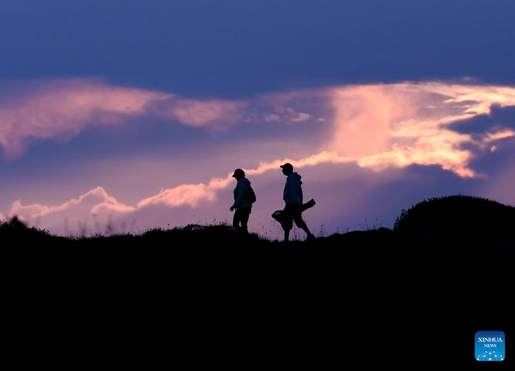 People enjoy scenery near Bosporus Strait in Istanbul, Türkiye