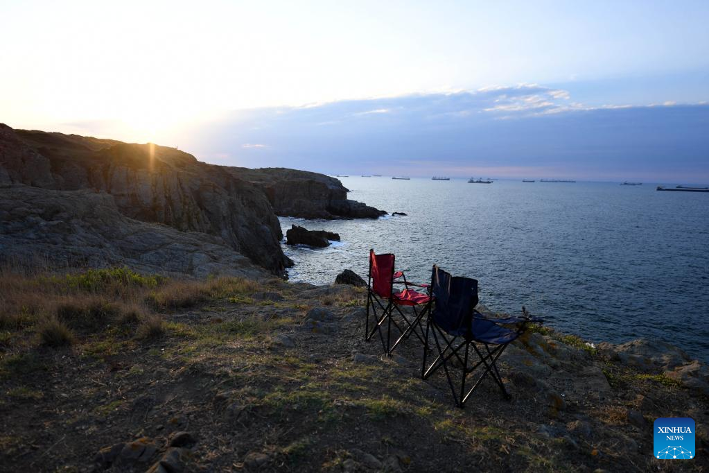 People enjoy scenery near Bosporus Strait in Istanbul, Türkiye