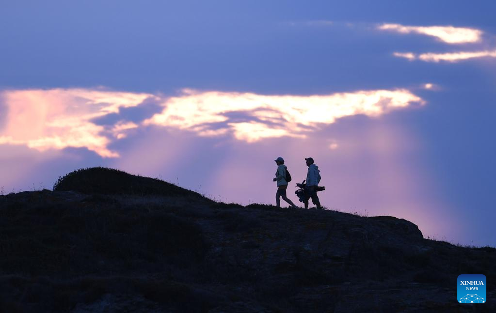 People enjoy scenery near Bosporus Strait in Istanbul, Türkiye