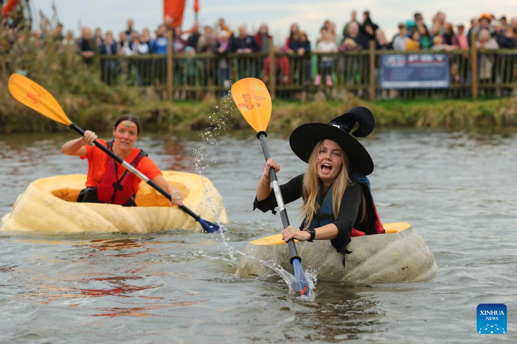 People compete in pumpkin regatta in Belgium