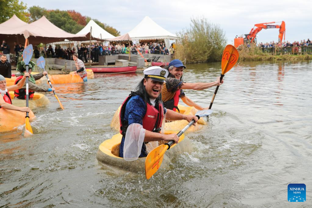 People compete in pumpkin regatta in Belgium