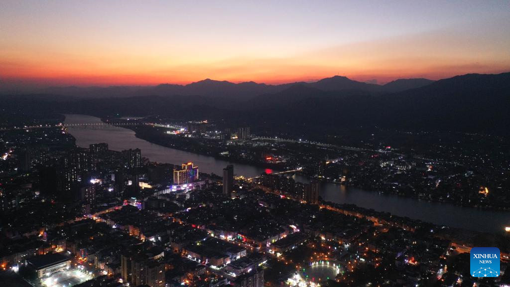 In pics: sunset glow over Rongjiang River in S China's Guangxi