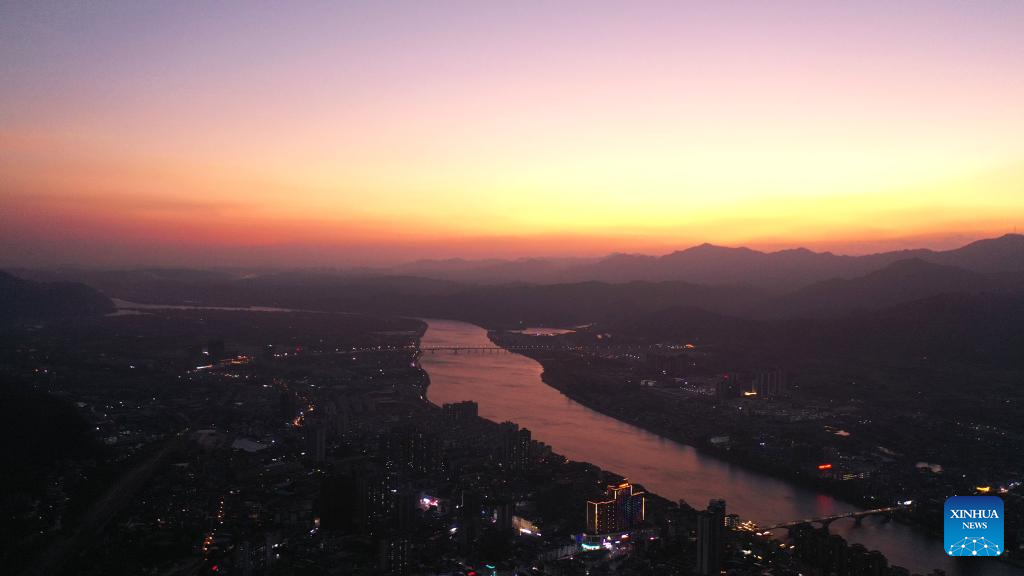 In pics: sunset glow over Rongjiang River in S China's Guangxi