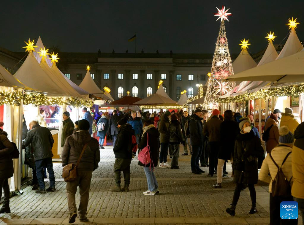People visit Christmas market in Berlin, Germany