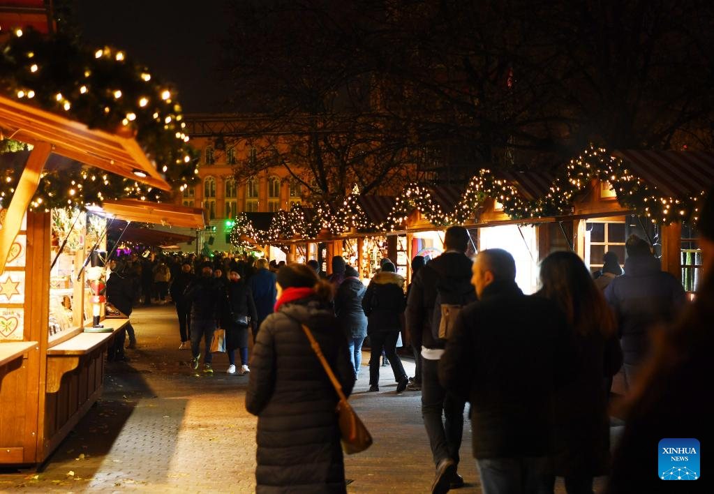 People visit Christmas market in Berlin, Germany