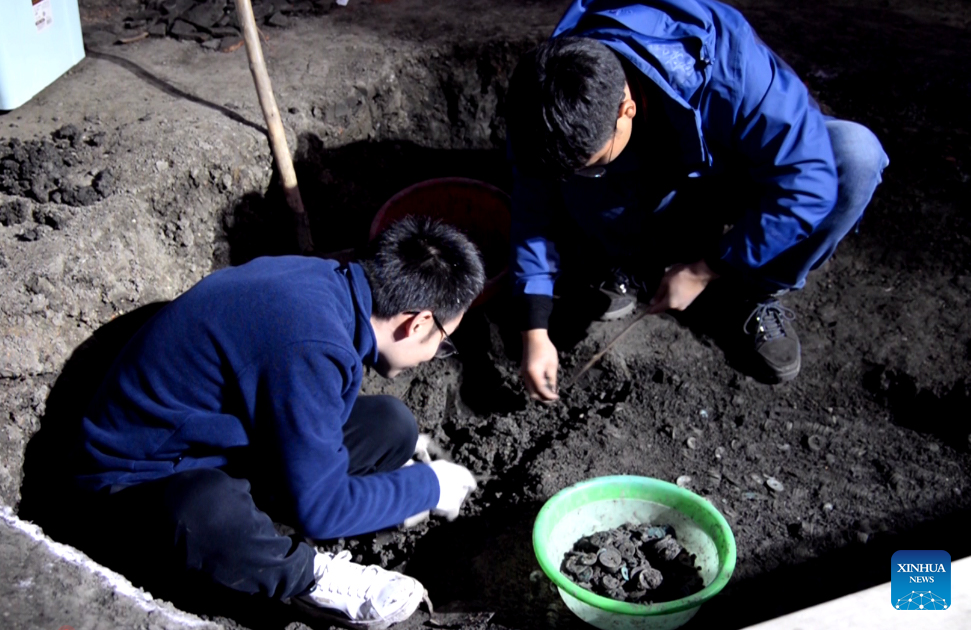 Tonnes of millennia-old coins found in east China