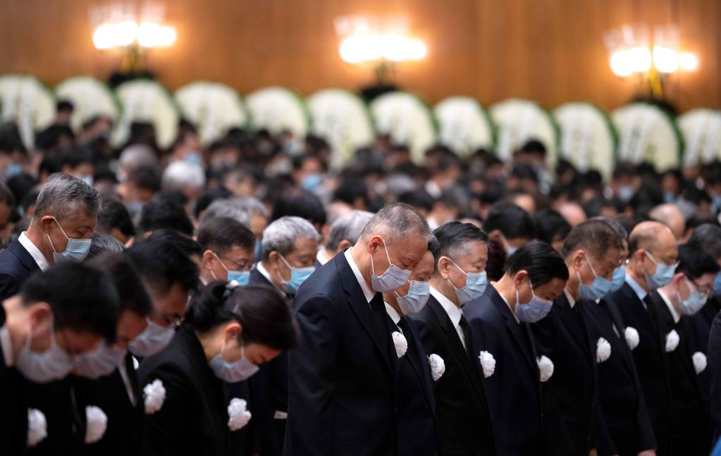 Memorial meeting held to mourn Jiang Zemin