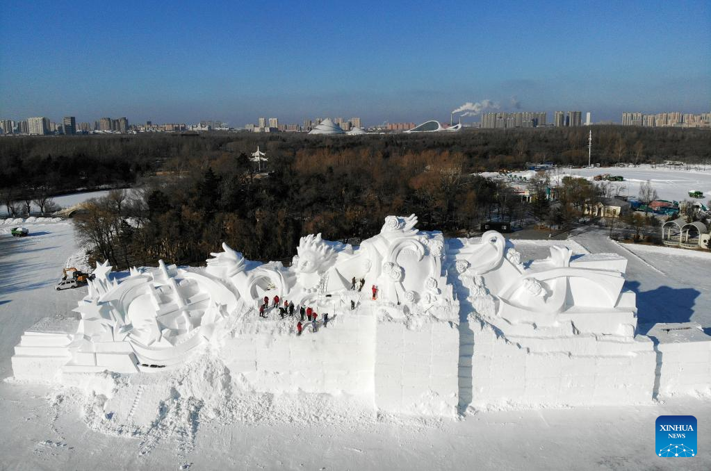 Preparations made for snow sculpture expo in Harbin, NE China