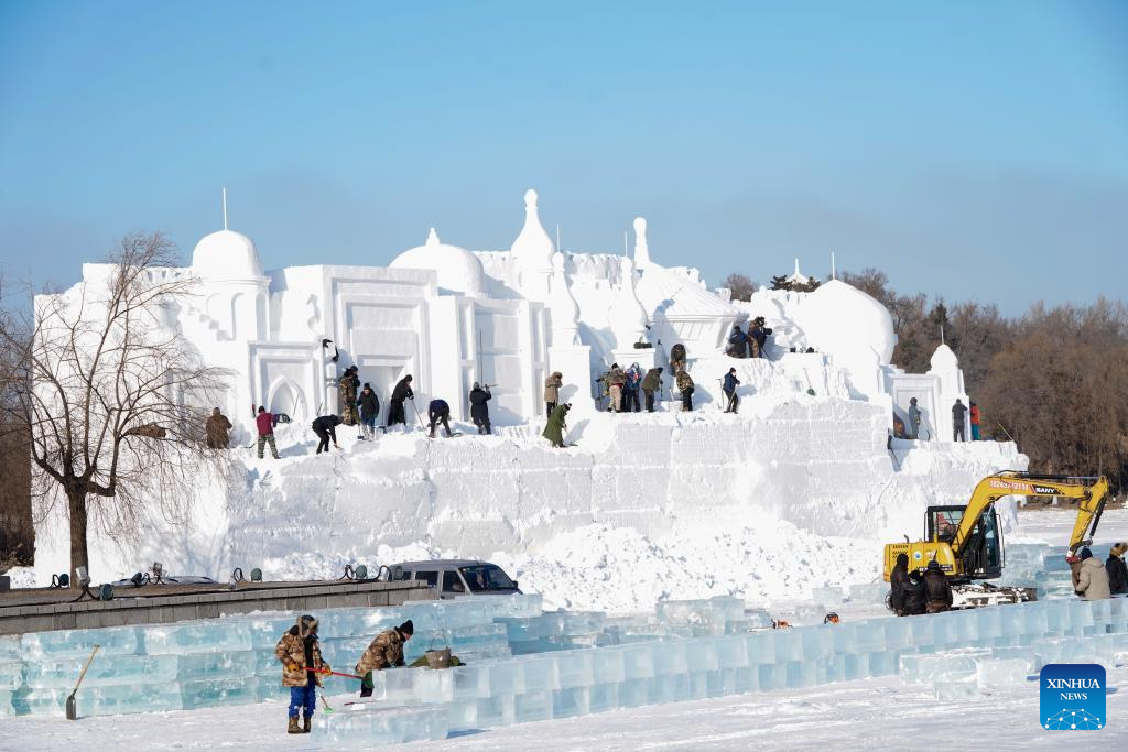 Preparations made for snow sculpture expo in Harbin, NE China