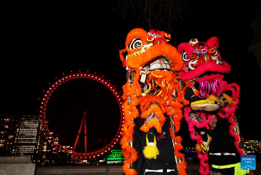 London Eye illuminated in red to celebrate upcoming Chinese New Year