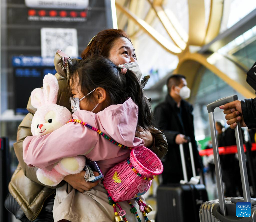 People on their way for family reunions during Spring Festival travel rush