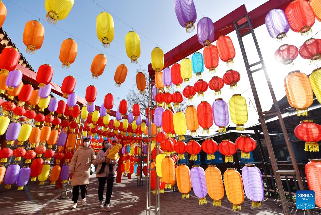 People celebrate upcoming Spring Festival across China