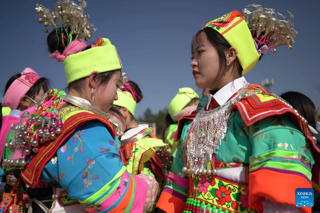 Miao people participate in traditional dancing activity in SW China's Guizhou