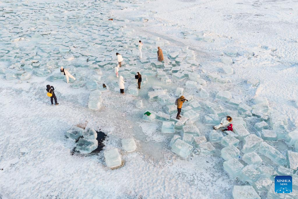 People have fun with ice cubes in northeast China's Heilongjiang