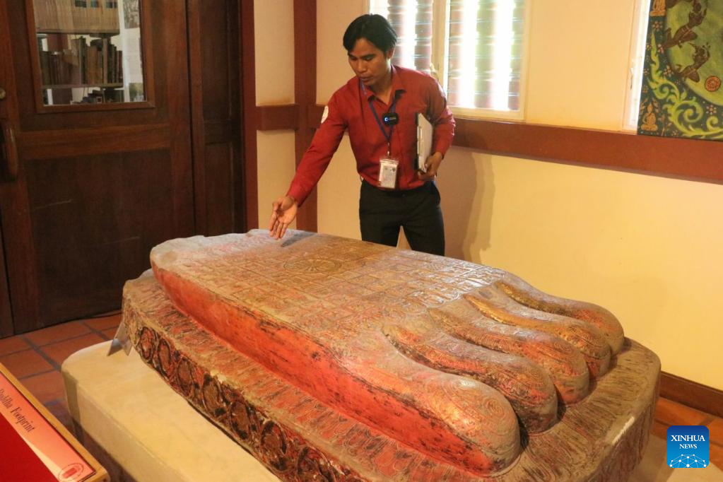 Centuries-old 3-ton Buddha footprint statue exhibited at museum in NW Cambodia