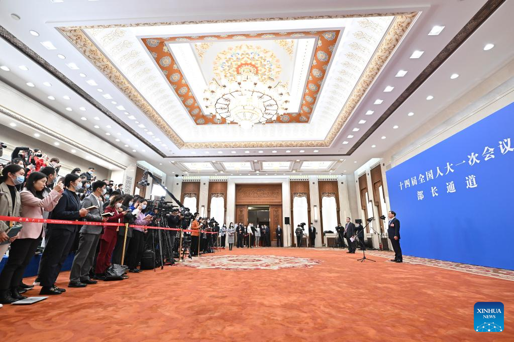 Ministers interviewed after opening meeting of first session of 14th NPC