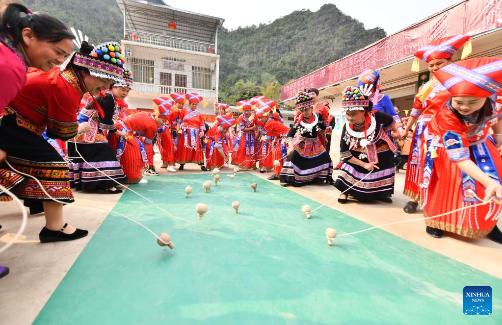 Spining top competition held to celebrate upcoming Int'l Women's Day in S China's Guangxi