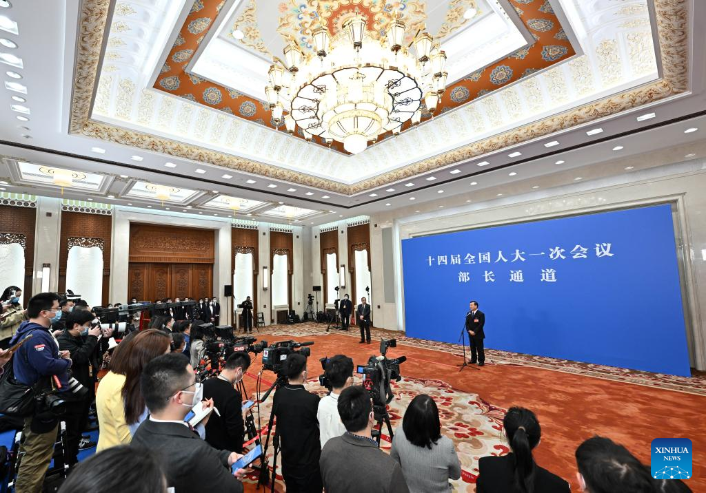 Ministers interviewed after 2nd plenary meeting of 1st session of 14th NPC