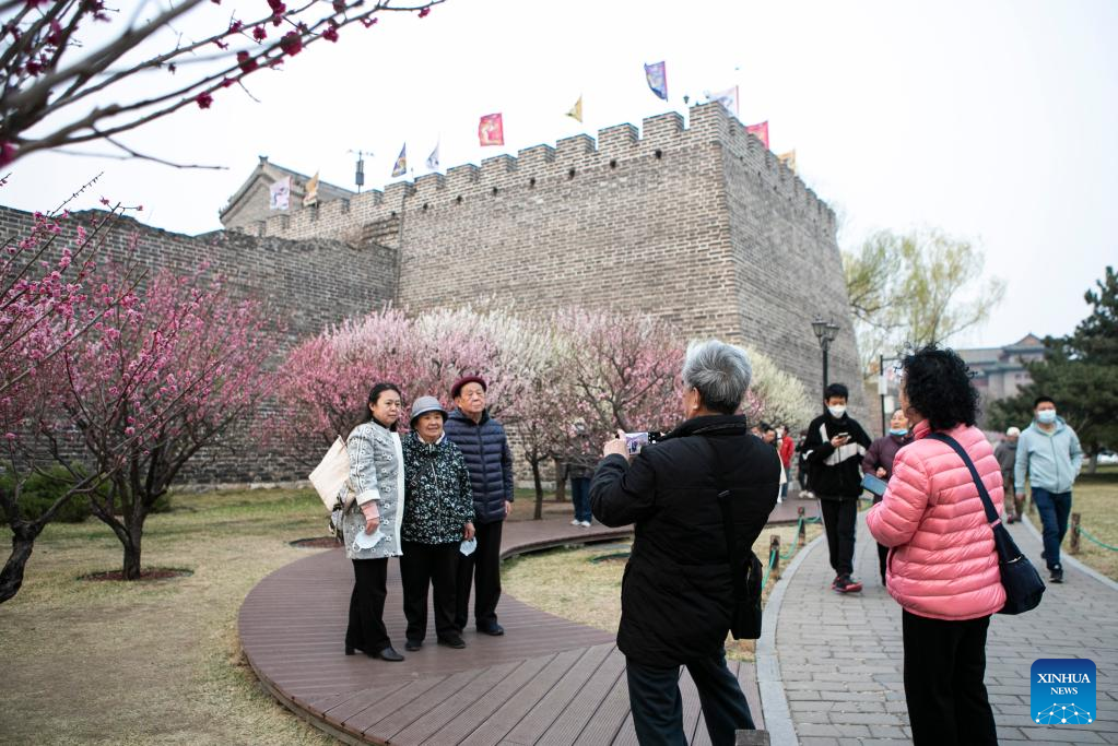 Blooming flowers attract tourists to Ming City Wall Site Park in Beijing