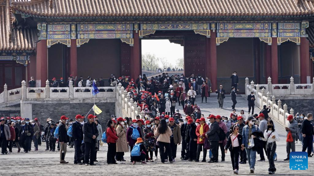 Tourists visit Palace Museum in Beijing