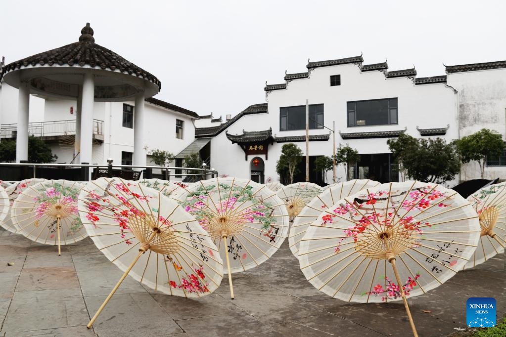 Across China: Traditional oil-paper umbrellas unfurl with flying colors