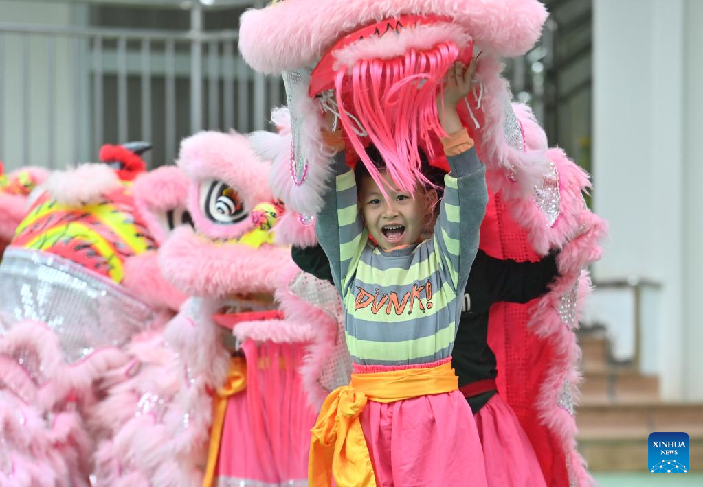Lion dance integrated with school education in Tengxian, S China