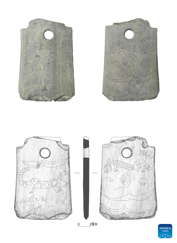 Millenniums-old tiger-patterned ritual weapon unearthed in east China