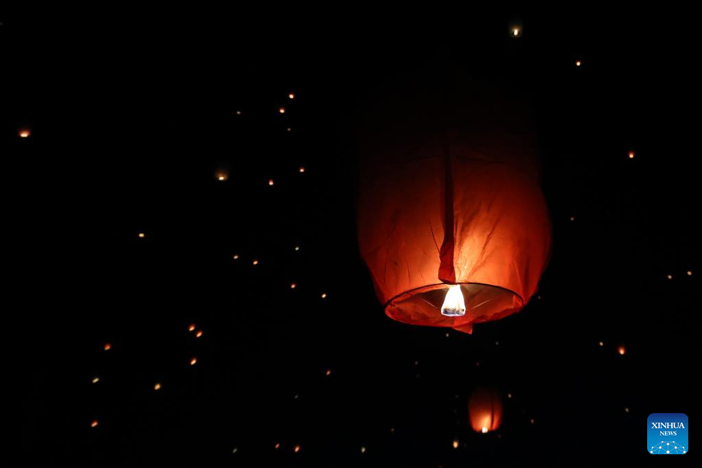 Sky lanterns released during annual Water Splashing Festival in SW China