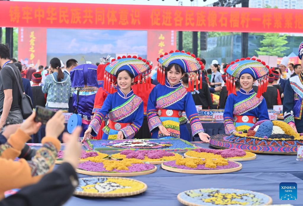Gourmet competition marks traditional Sanyuesan festival in S China's Guangxi