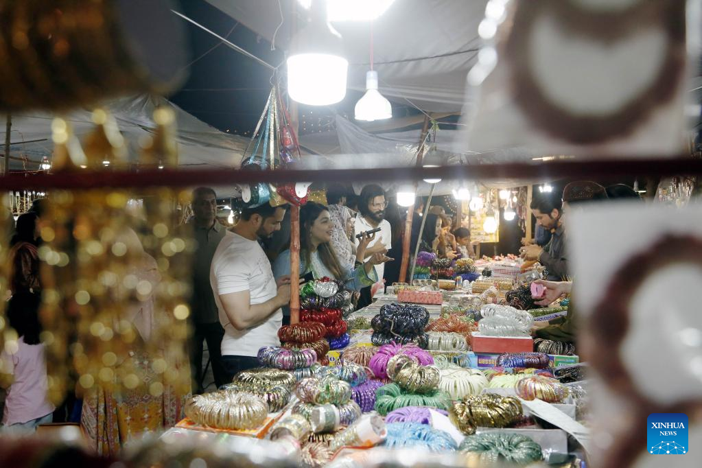 People prepare for Eid al-Fitr festival