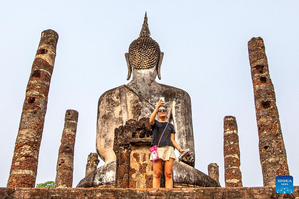 Tourists visit Historic Town of Sukhothai in Thailand
