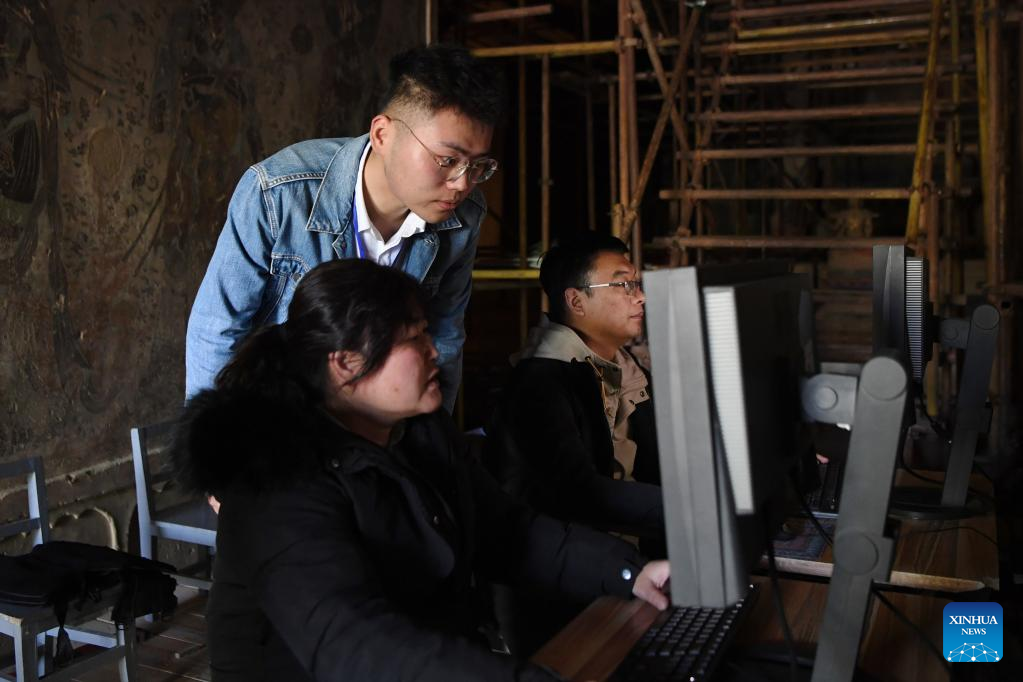 Young technicians use digital technology to preserve cultural relics in Mogao Grottoes