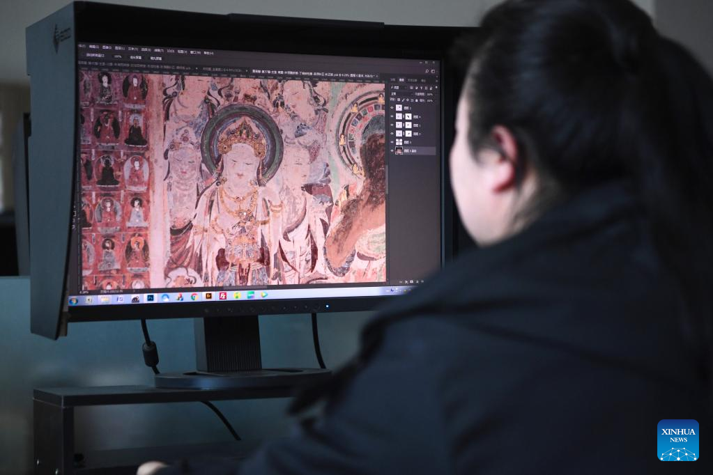 Young technicians use digital technology to preserve cultural relics in Mogao Grottoes