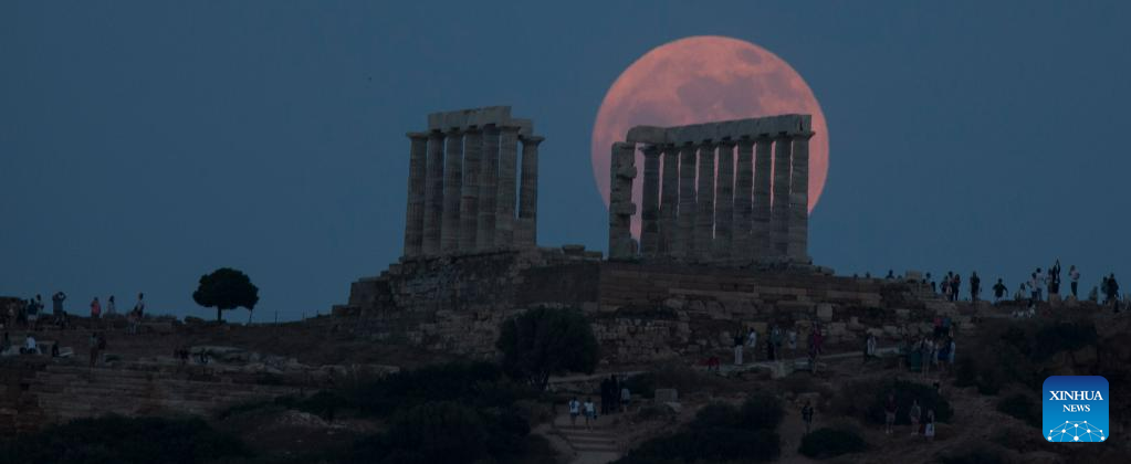 View of full moon in Sounion, Greece