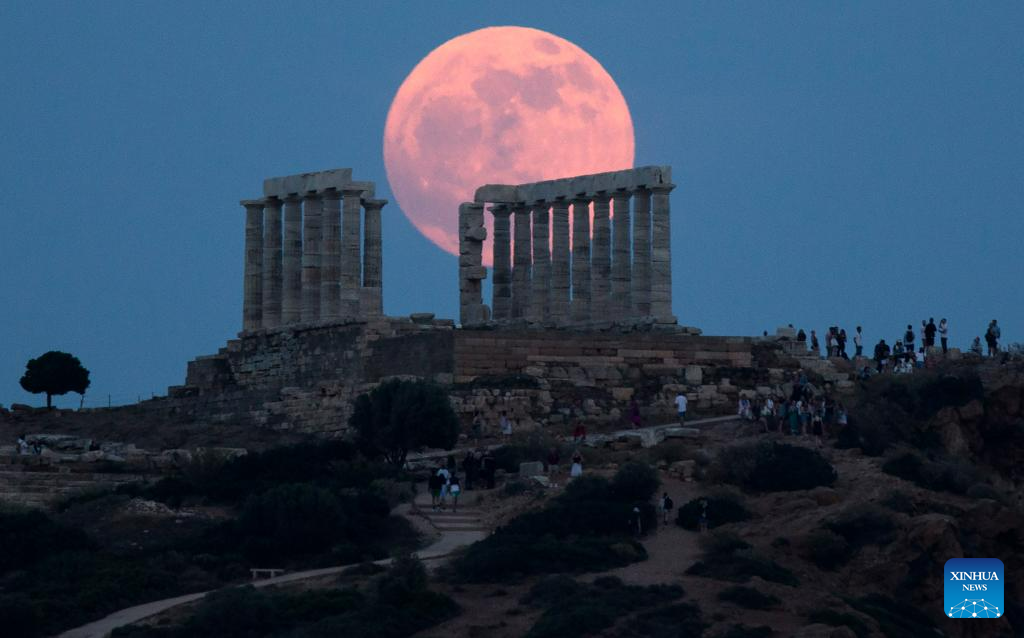 View of full moon in Sounion, Greece