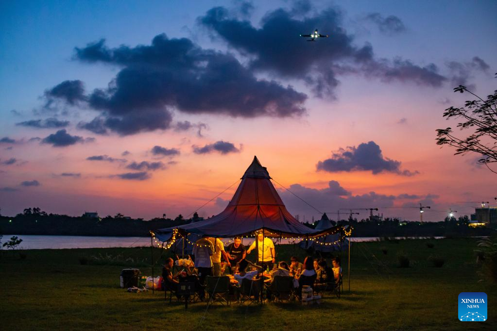 Across China: Camping gains popularity in south China's Hainan