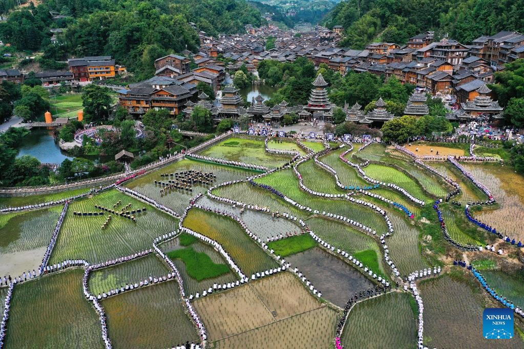 People participate in folk music performance in SW China's Guizhou